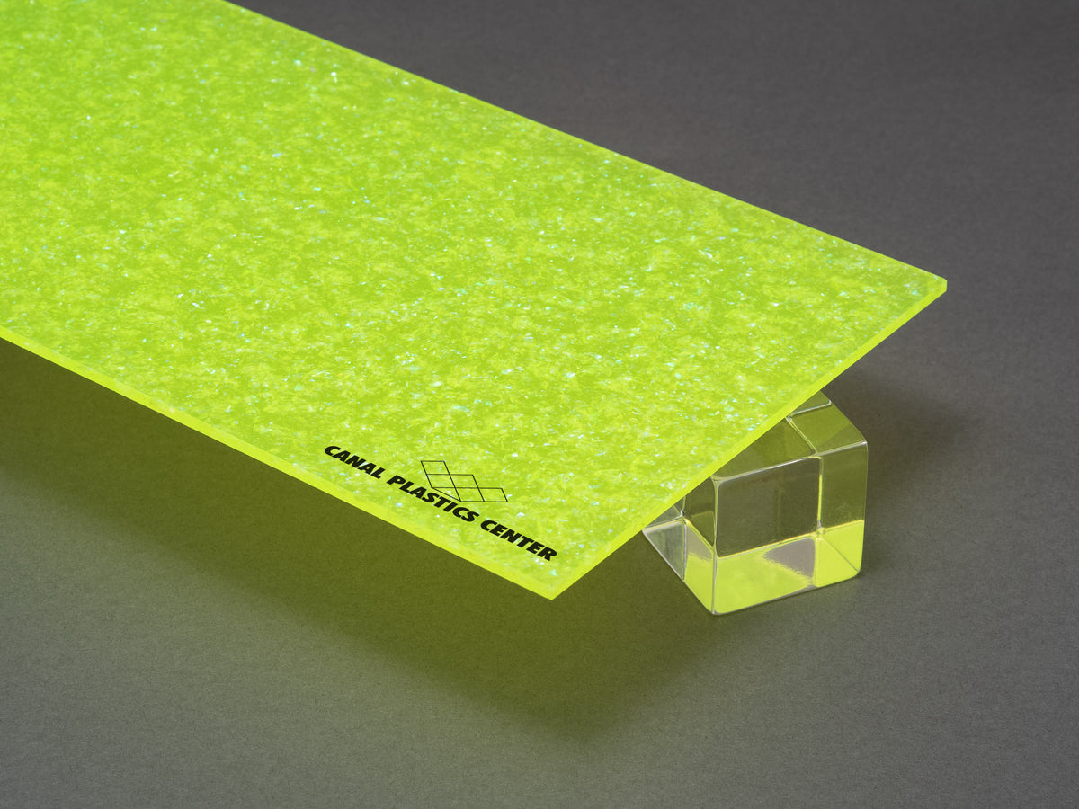 Canal Plastics Center's Green Neon Glitter acrylic, part of the Urban Spark Collection, electrifies any design with its bold, vivid, high-voltage hue and sparkling finish. Its durable acrylic base ensures lasting brilliance, while the glitter adds a dynamic pop that turns ordinary into unforgettable.