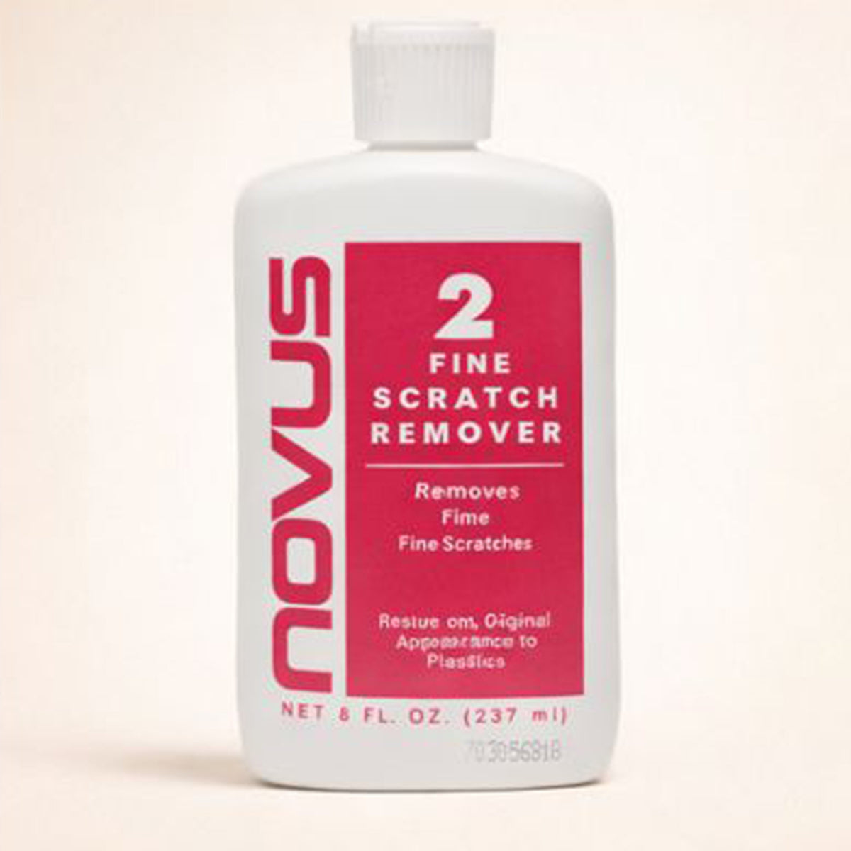 Novus Fine Scratch Remover bottle on a light beige background