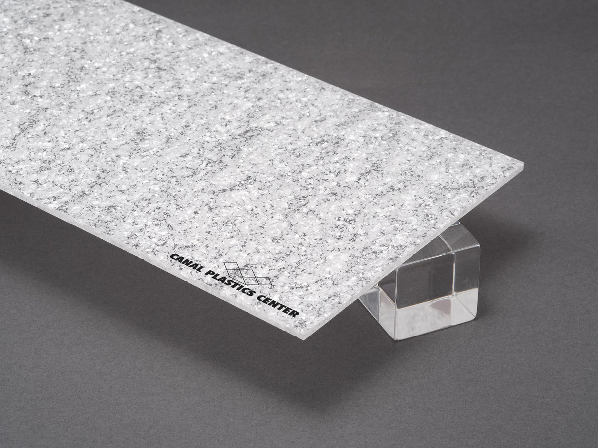 Canal Plastics Center's Winter White Glitter acrylic captures the magic of a snowy day with its soft, frosty hue and sparkling shimmer. This luminous material adds a touch of enchantment to any design, evoking the quiet elegance of winter while offering the durability and polish of acrylic.