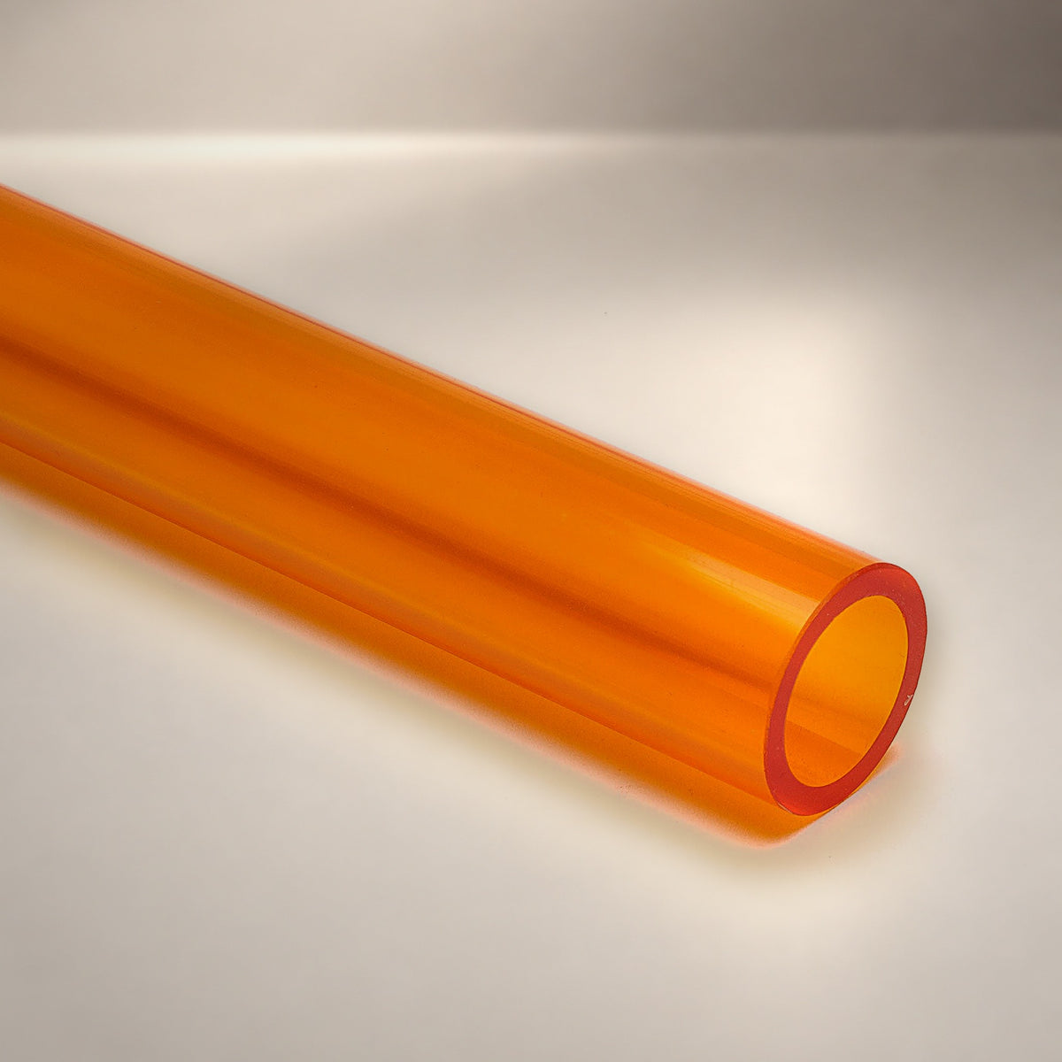 Amber transparent acrylic round tube - Canal Plastics Center