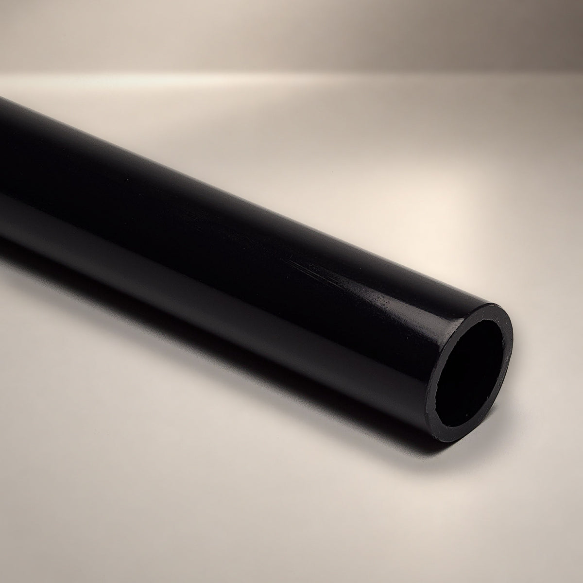 Black opaque acrylic round tube - Canal Plastics Center