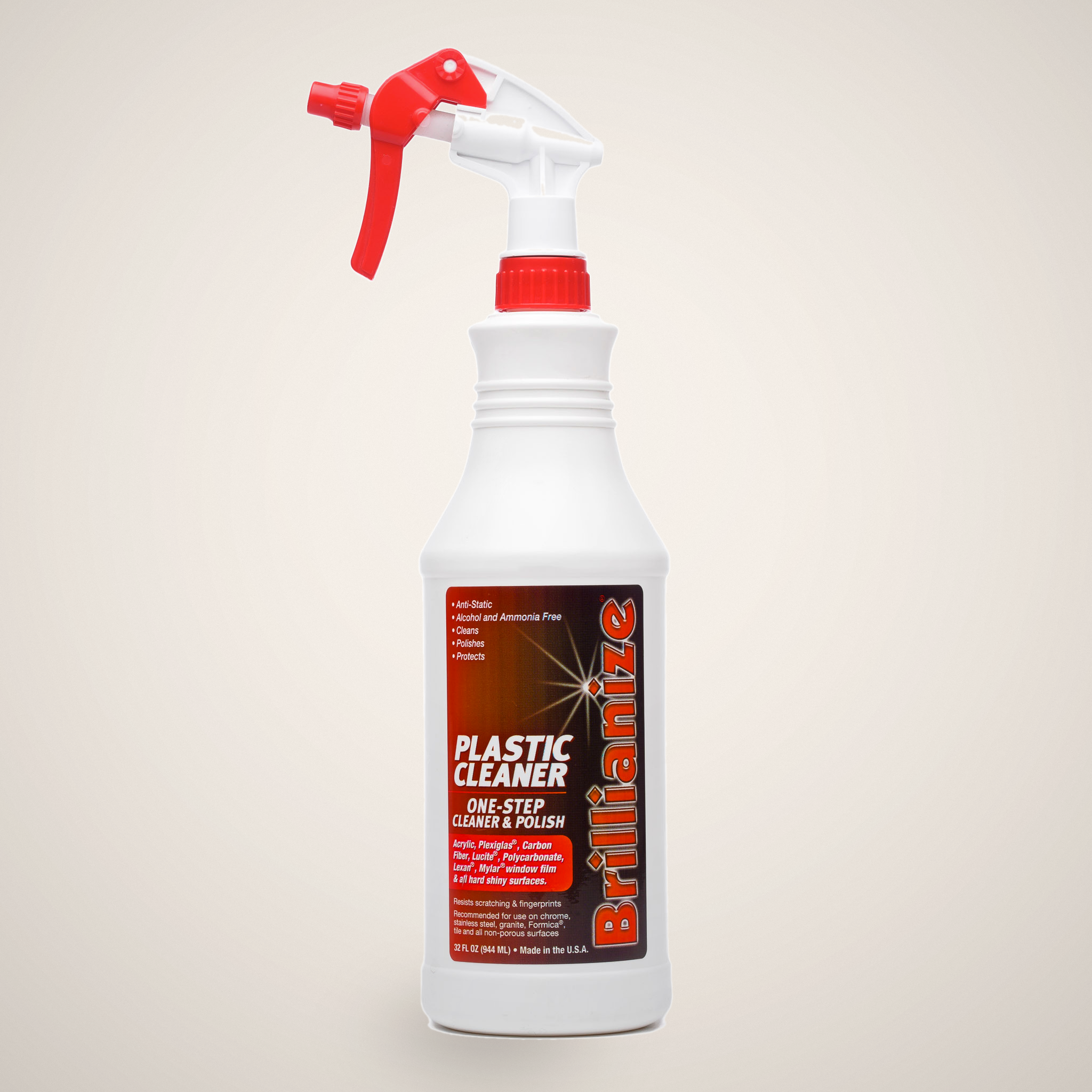 Spray bottle labeled 'Brillianze Plastic Cleaner' on a beige background