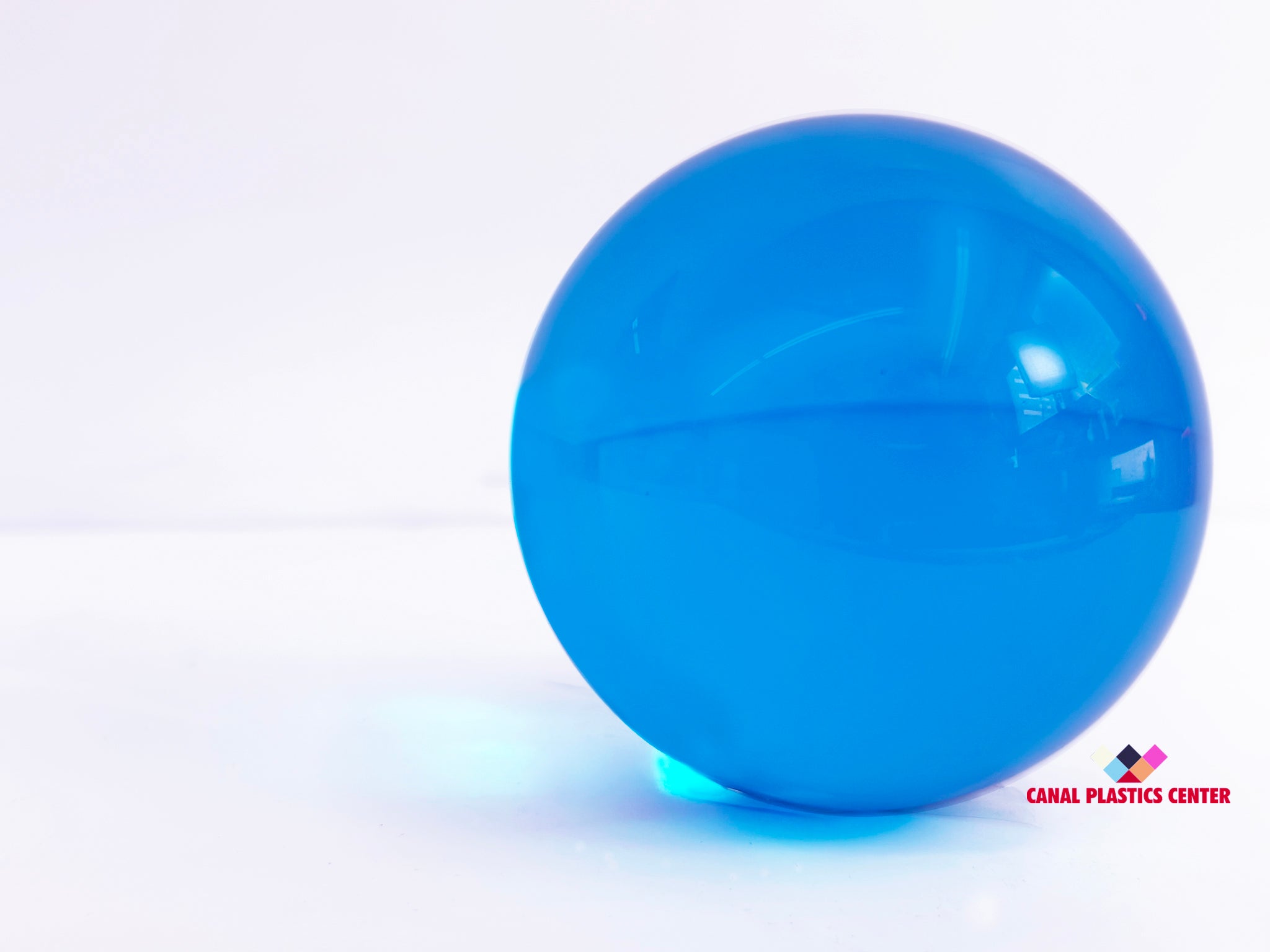 Canal Plastics Center Blue Transparent Acrylic Sphere, wide view, bright background - for decorative and artistic uses to scientific and industrial purposes such as displays and visual merchandising, art installations and sculptures, photography props and effects, home decor, costume and prop making, optical applications, model making and prototyping, furniture accessories and more