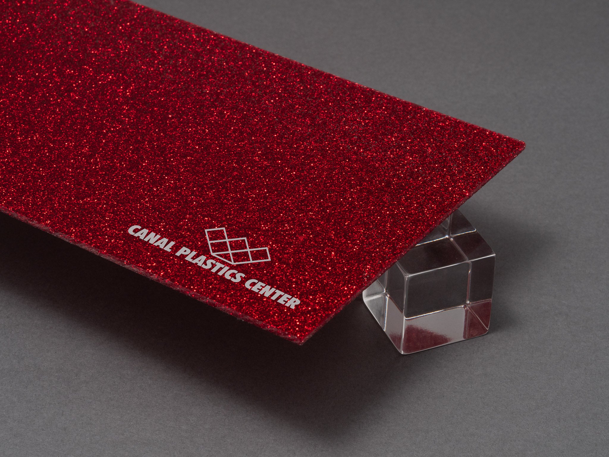 Canal Plastics Center Red Glitter Acrylic Plexiglass Sheet, Top View - Urban Spark Collection for crafts, signage, displays, and even furniture accents