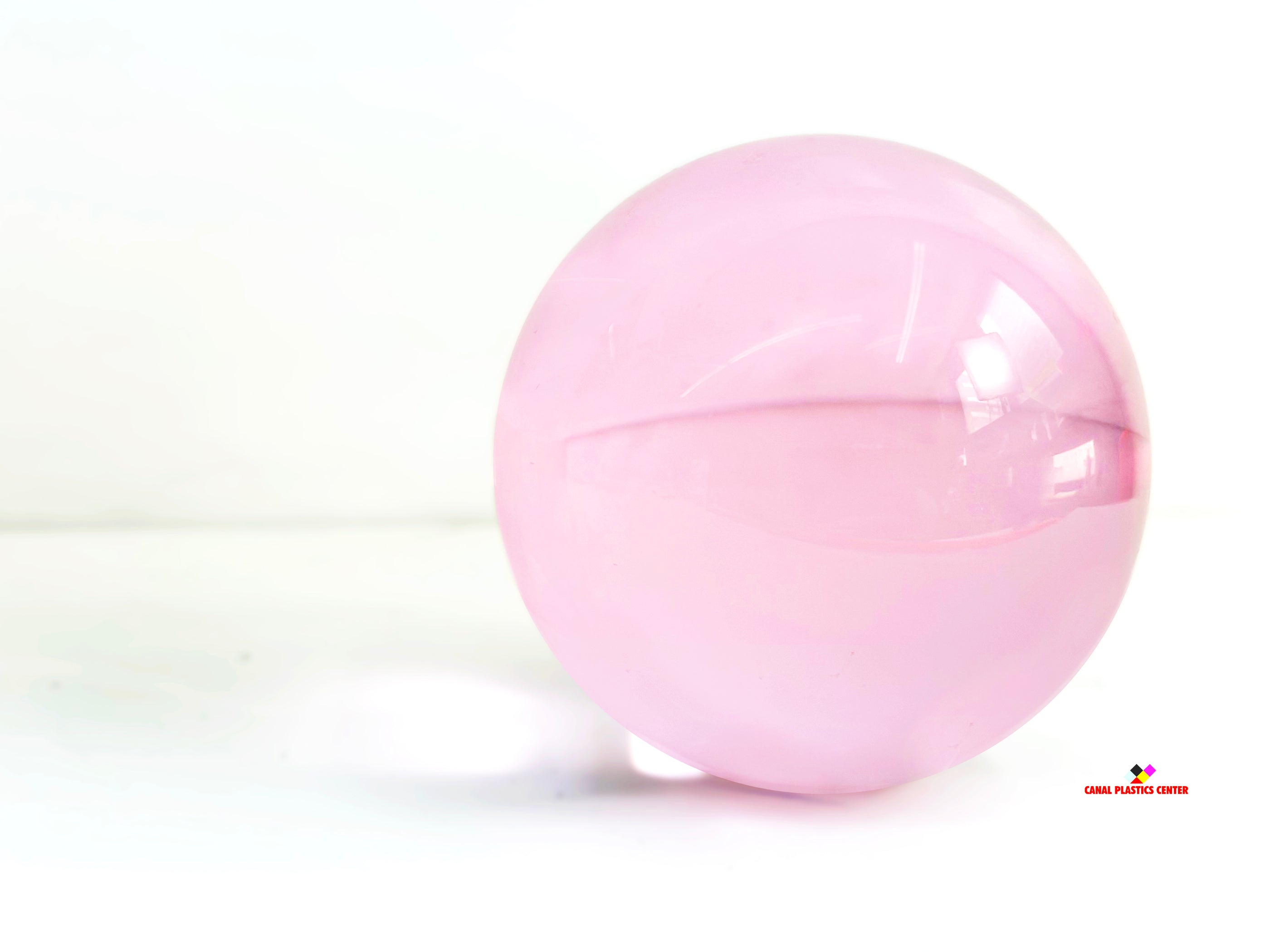 Canal Plastics Center Pink Transparent Acrylic Sphere, wide view, bright background - for decorative and artistic uses to scientific and industrial purposes such as displays and visual merchandising, art installations and sculptures, photography props and effects, home decor, costume and prop making, optical applications, model making and prototyping, furniture accessories and more