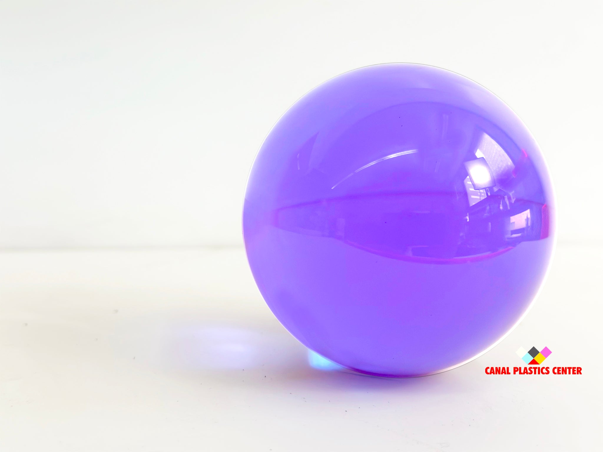 Canal Plastics Center Purple Transparent Acrylic Sphere, wide view, bright background - for decorative and artistic uses to scientific and industrial purposes such as displays and visual merchandising, art installations and sculptures, photography props and effects, home decor, costume and prop making, optical applications, model making and prototyping, furniture accessories and more