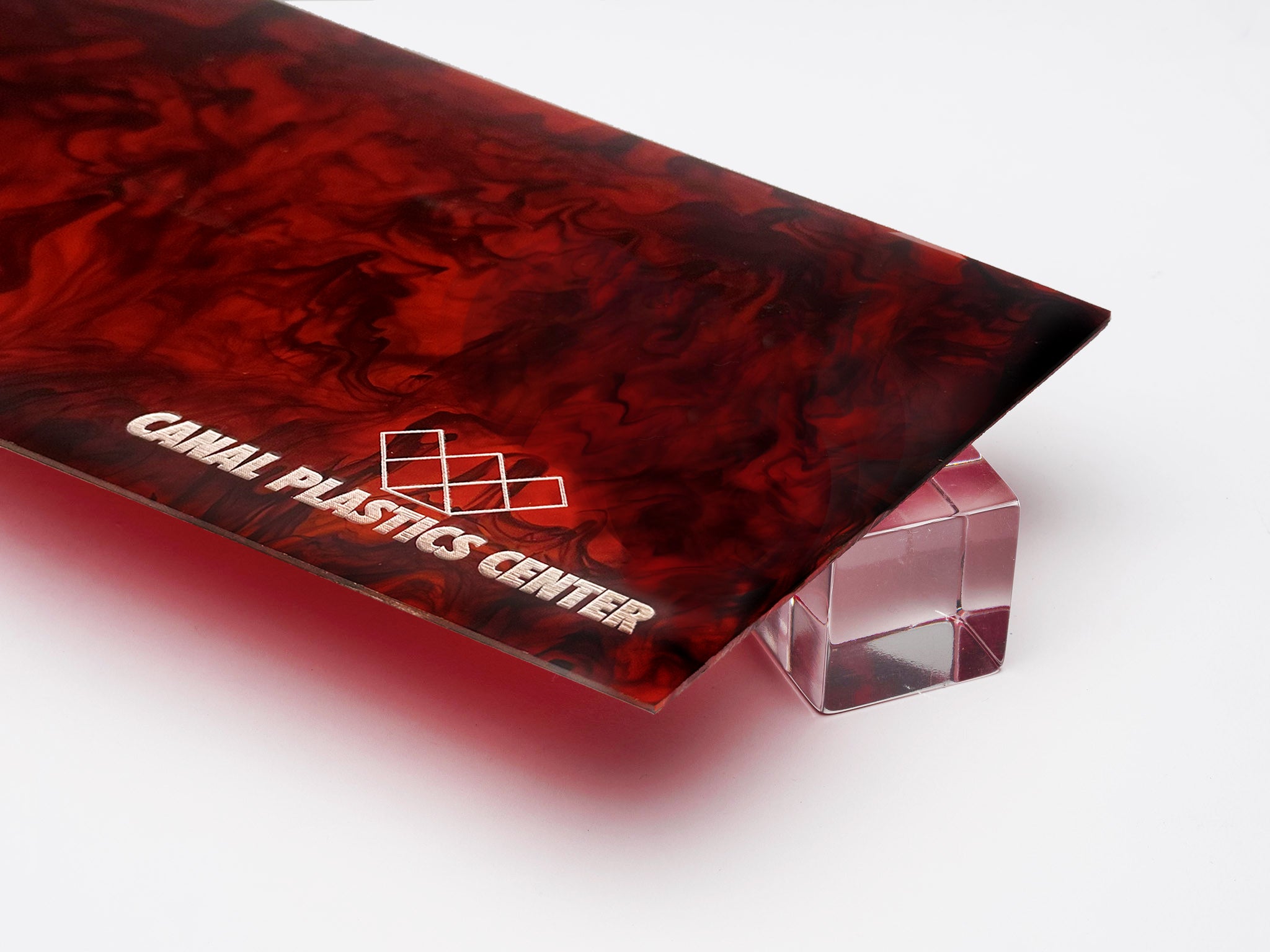 Canal Plastics Center's Fire Tortoise Shell acrylic brings a rich, vintage-inspired aesthetic to modern design. With its fiery amber tones and swirling patterns, it mimics the timeless elegance of natural tortoiseshell while offering the durability and versatility of acrylic.