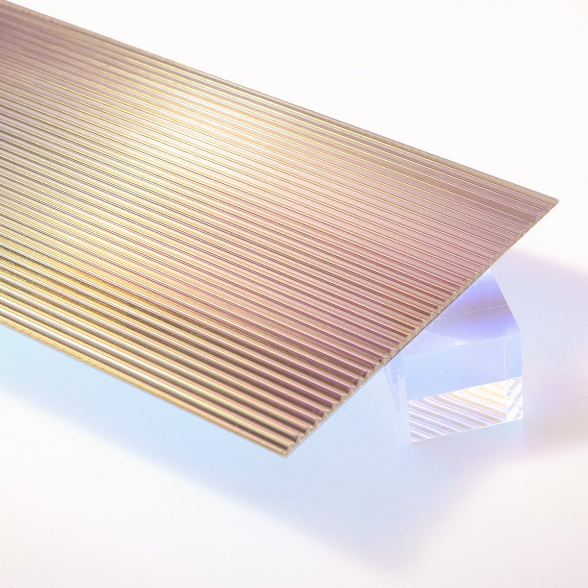 Iridescent Fluted Acrylic Plexiglass Sheet, ribbed face with a color shifting film on the flat back, Top view - Canal Plastics Center