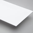 White Matte HIPS styrene sheets on off-white background – lightweight printable plastic - Canal Plastics Center