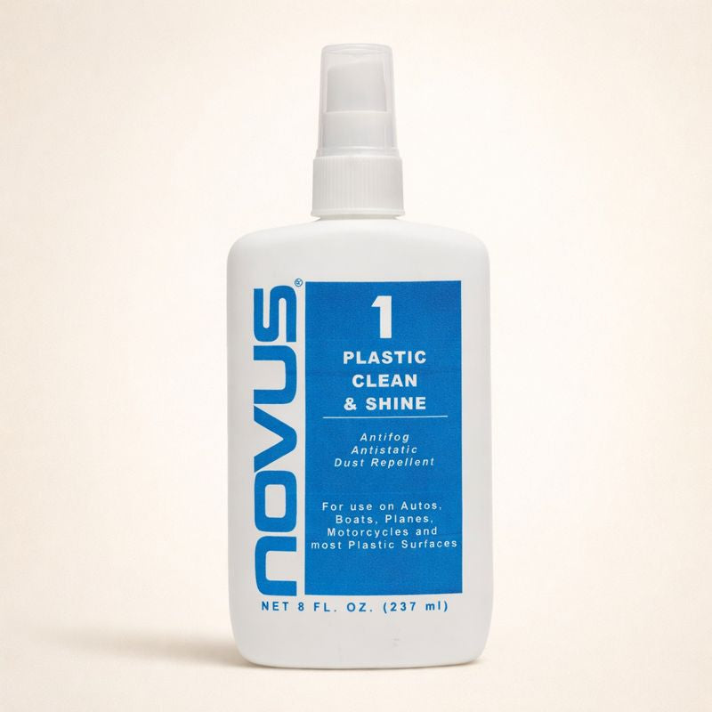 Novus Plastic Clean & Shine bottle on a beige background