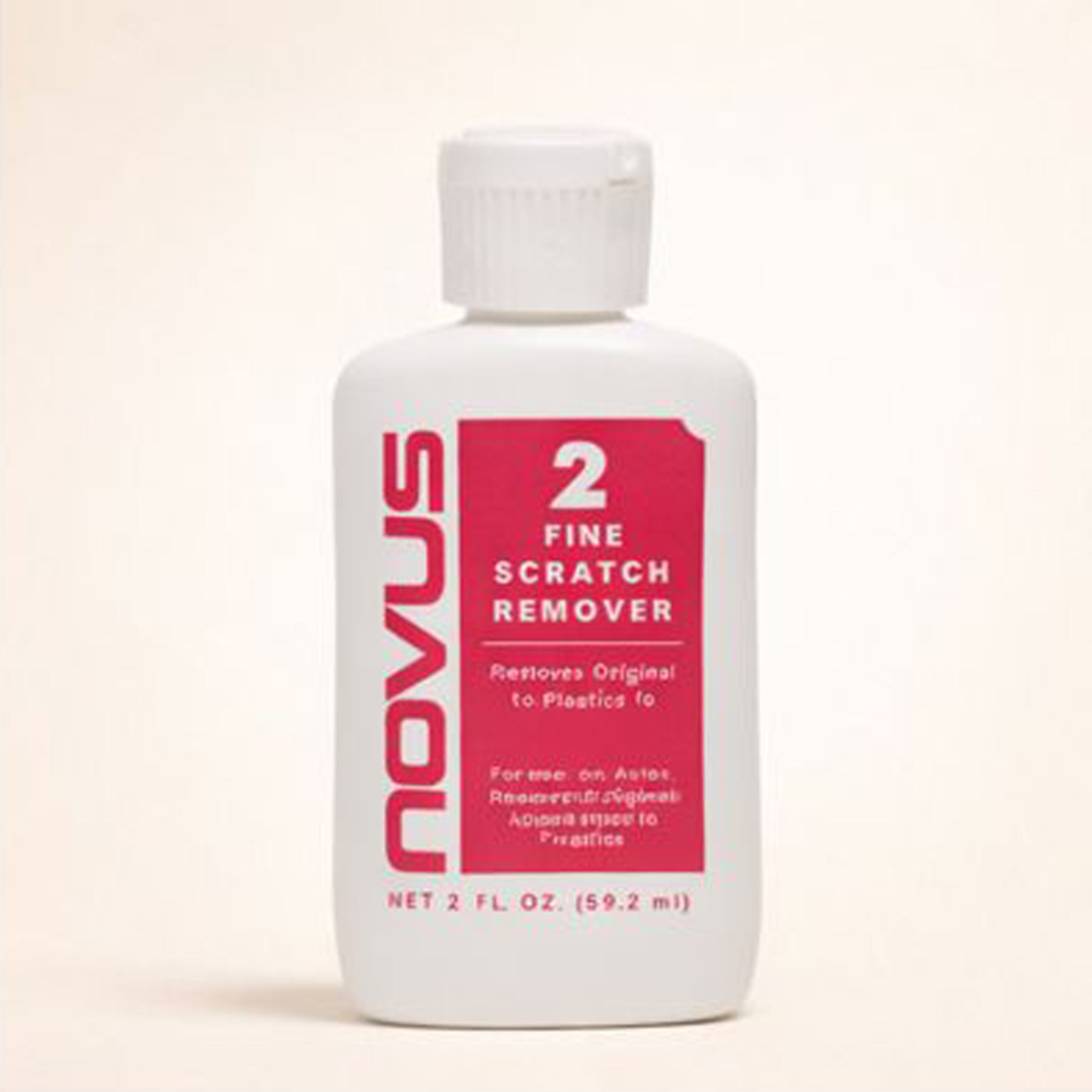 Novus Fine Scratch Remover bottle on a beige background