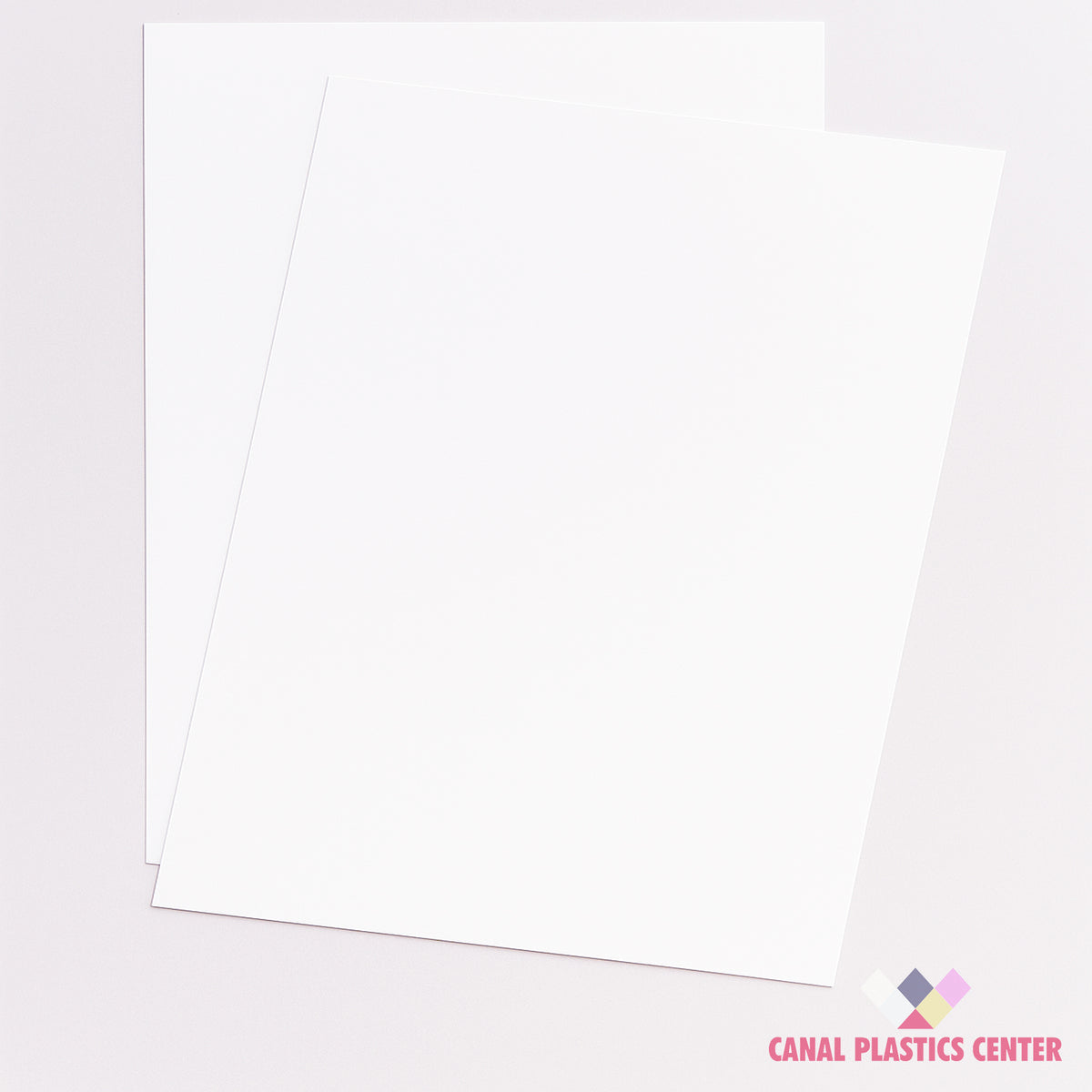 White Matte HIPS styrene sheets on off-white background – lightweight printable plastic - Canal Plastics